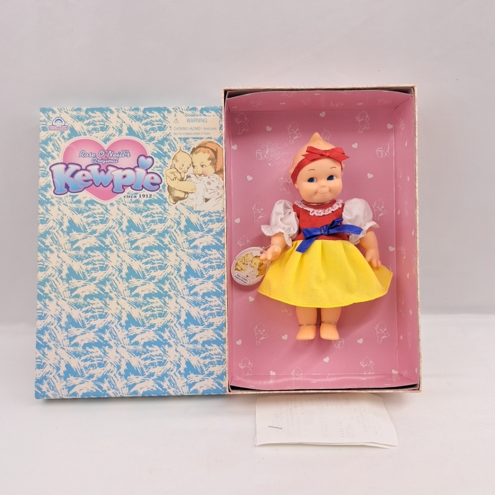 Vibrant Yellow and Red Doll with Accessories